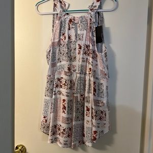 Cute sleeveless swing top